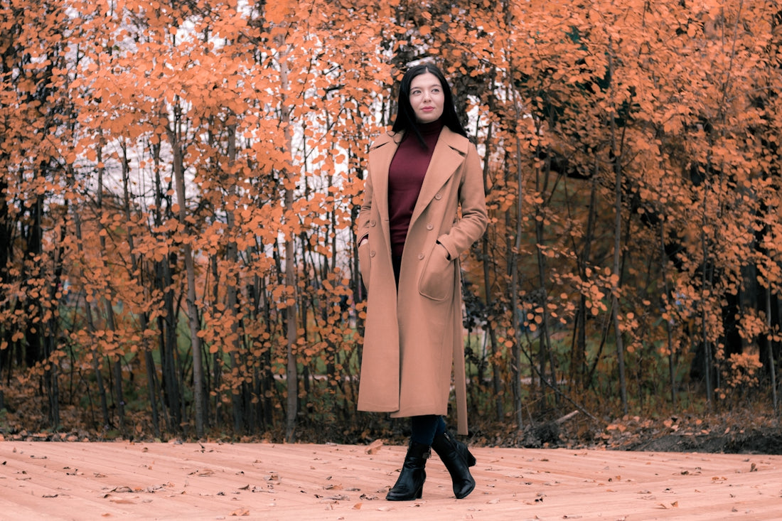 woman standing near trees during daytiame