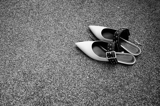 a pair of shoes sitting on the ground