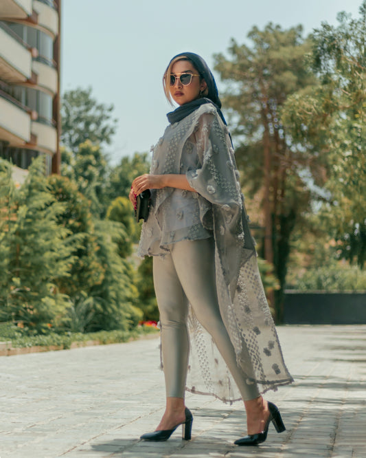 a person in a grey suit