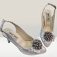 Sandale argintii din piele naturală cu toc și fundiță cu pietre – eleganță pentru evenimente speciale