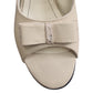 Pantofi eleganți crem cu toc de 7 cm și fundiță decorativă – decupaj lateral rafinat